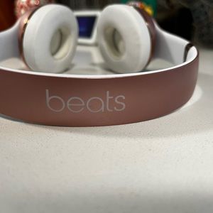 Rose gold beet headphones